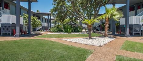 Outdoor pool, open 9:00 AM to 10:00 PM, pool loungers