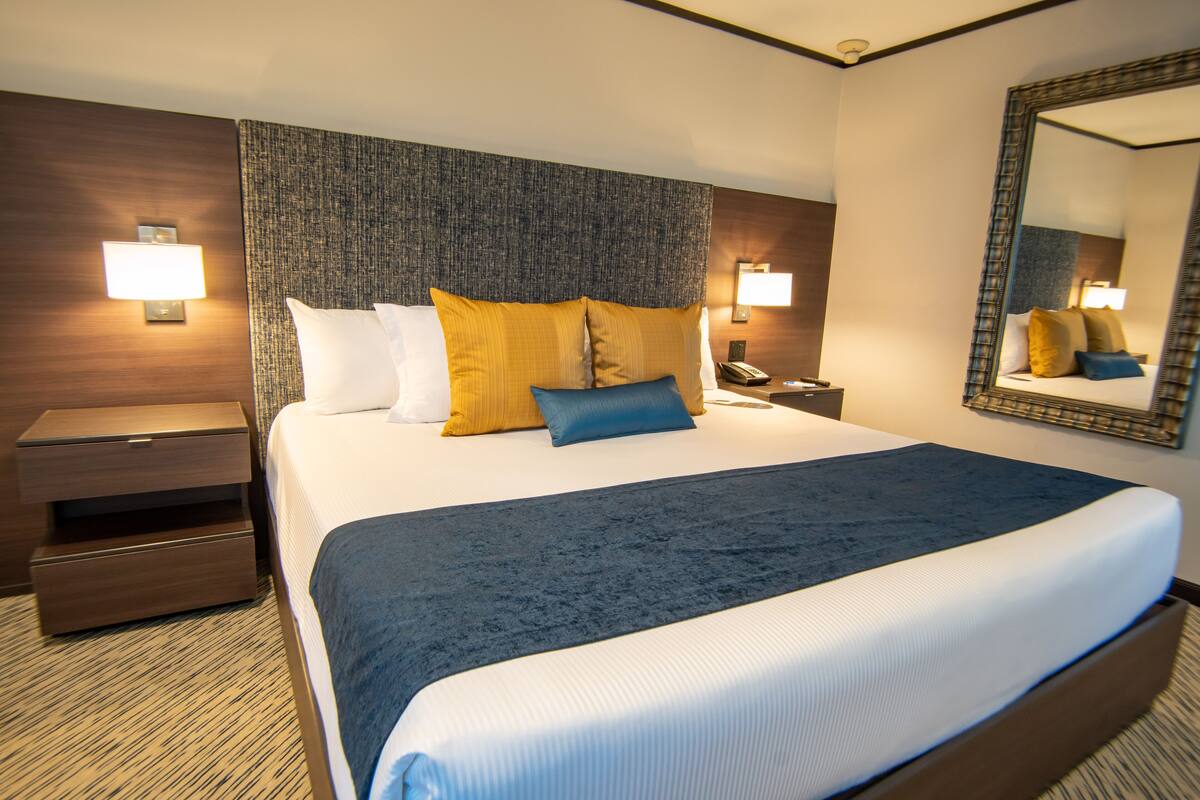 down duvets, pillow-top beds, desk, blackout curtains