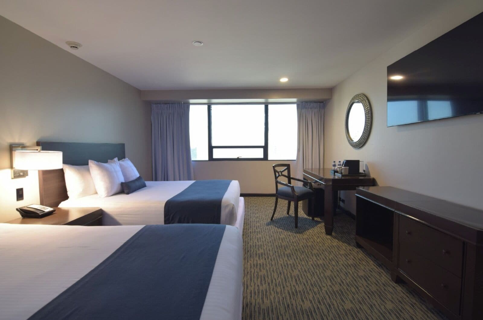 Down comforters, pillowtop beds, desk, laptop workspace