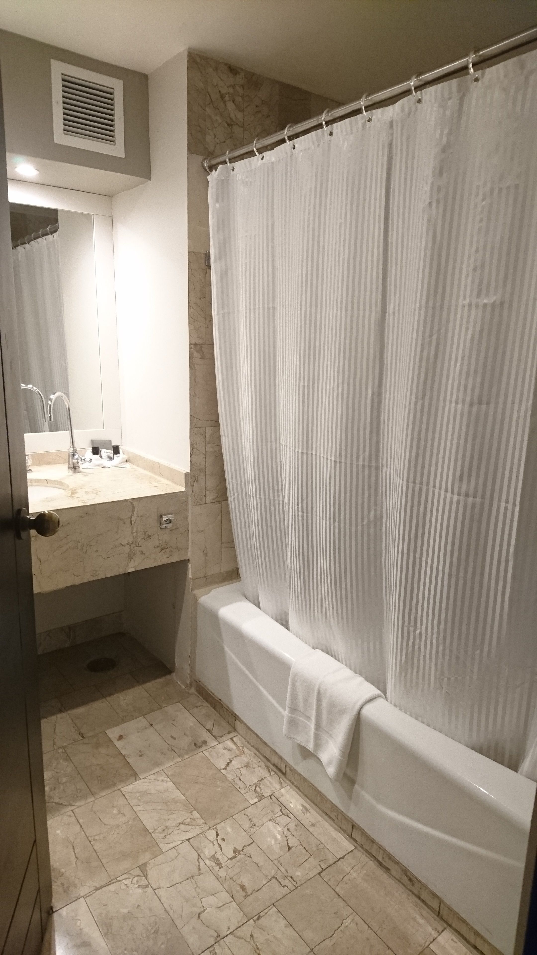 combined shower/bathtub, free toiletries, hair dryer, towels