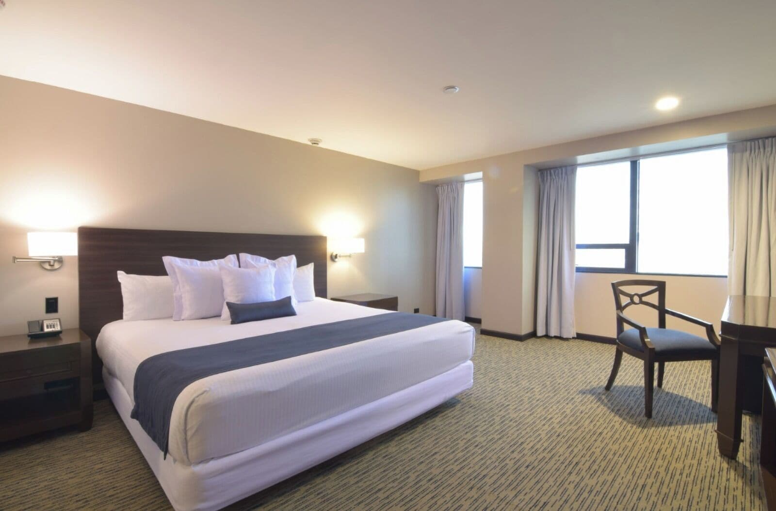 Down comforters, pillowtop beds, desk, laptop workspace