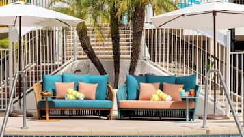 3 outdoor pools, open 7:00 AM to 10:00 PM, pool umbrellas, pool loungers