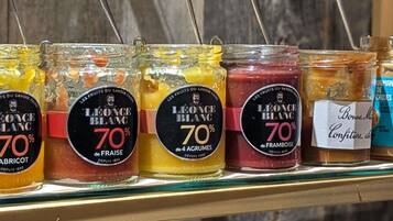 A selection of jars with labels indicating they are 70% fruit preserves.