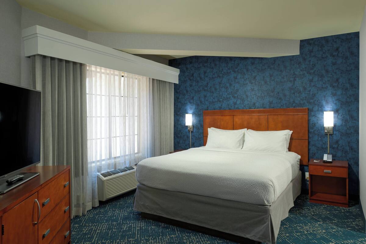 premium bedding, down duvets, pillow-top beds, in-room safe