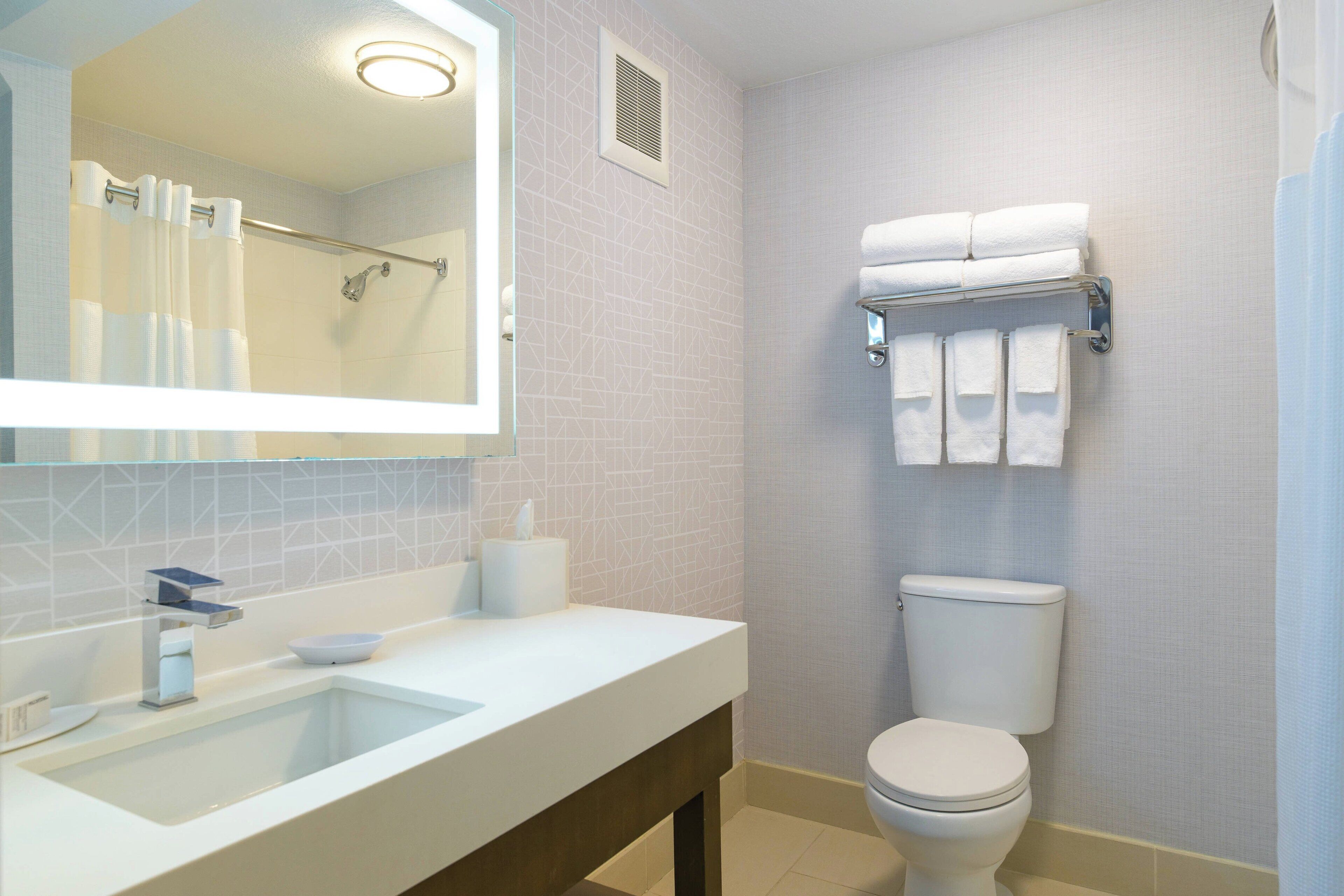 combined shower/bathtub, free toiletries, hair dryer, towels