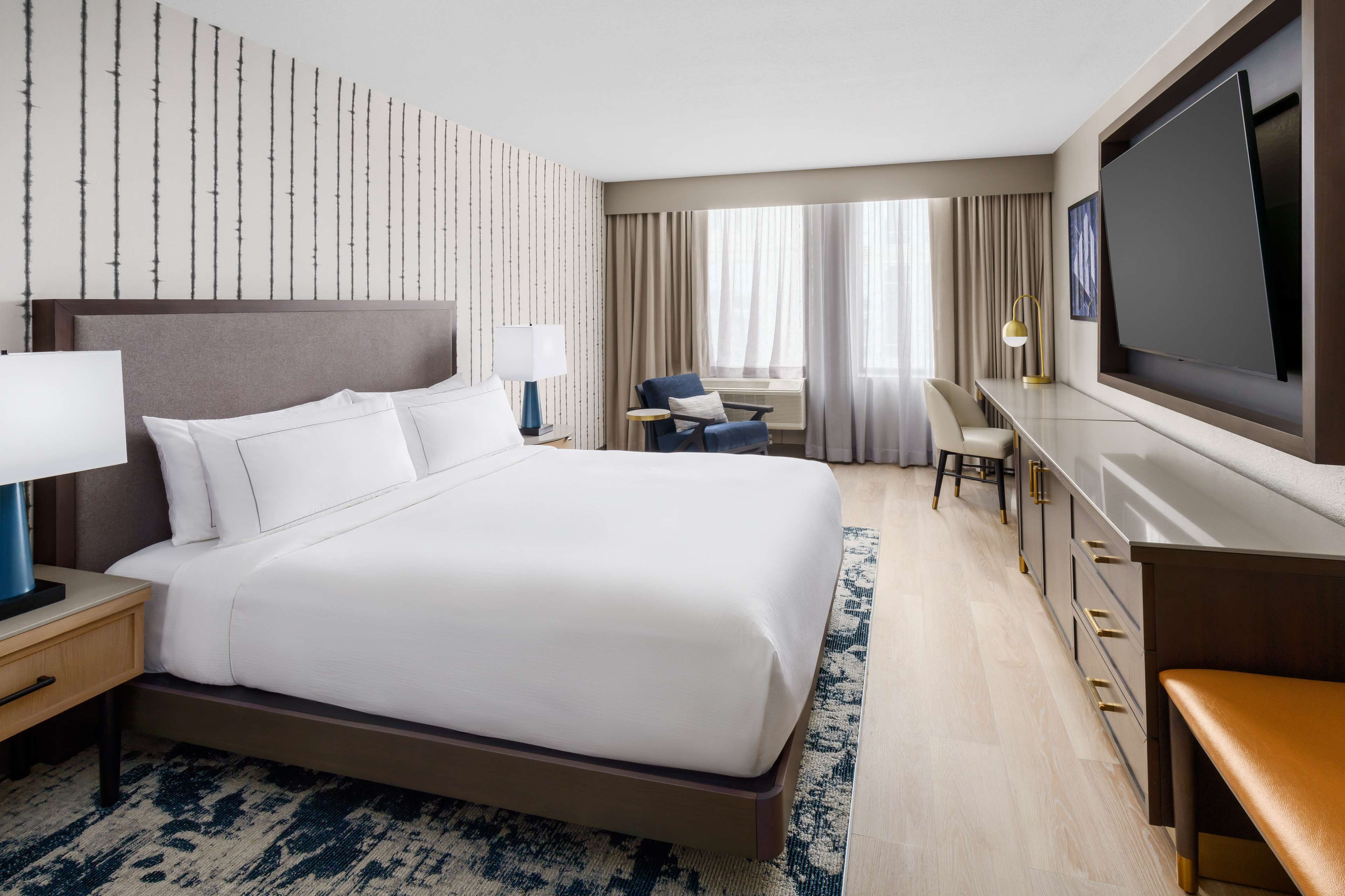 deluxe room, 1 king bed | in-room safe, desk, laptop workspace, blackout curtains