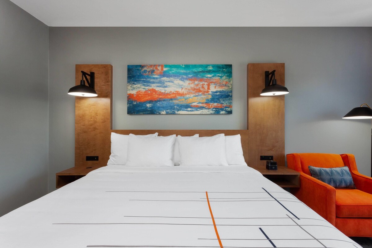 Premium bedding, desk, blackout curtains, iron/ironing board