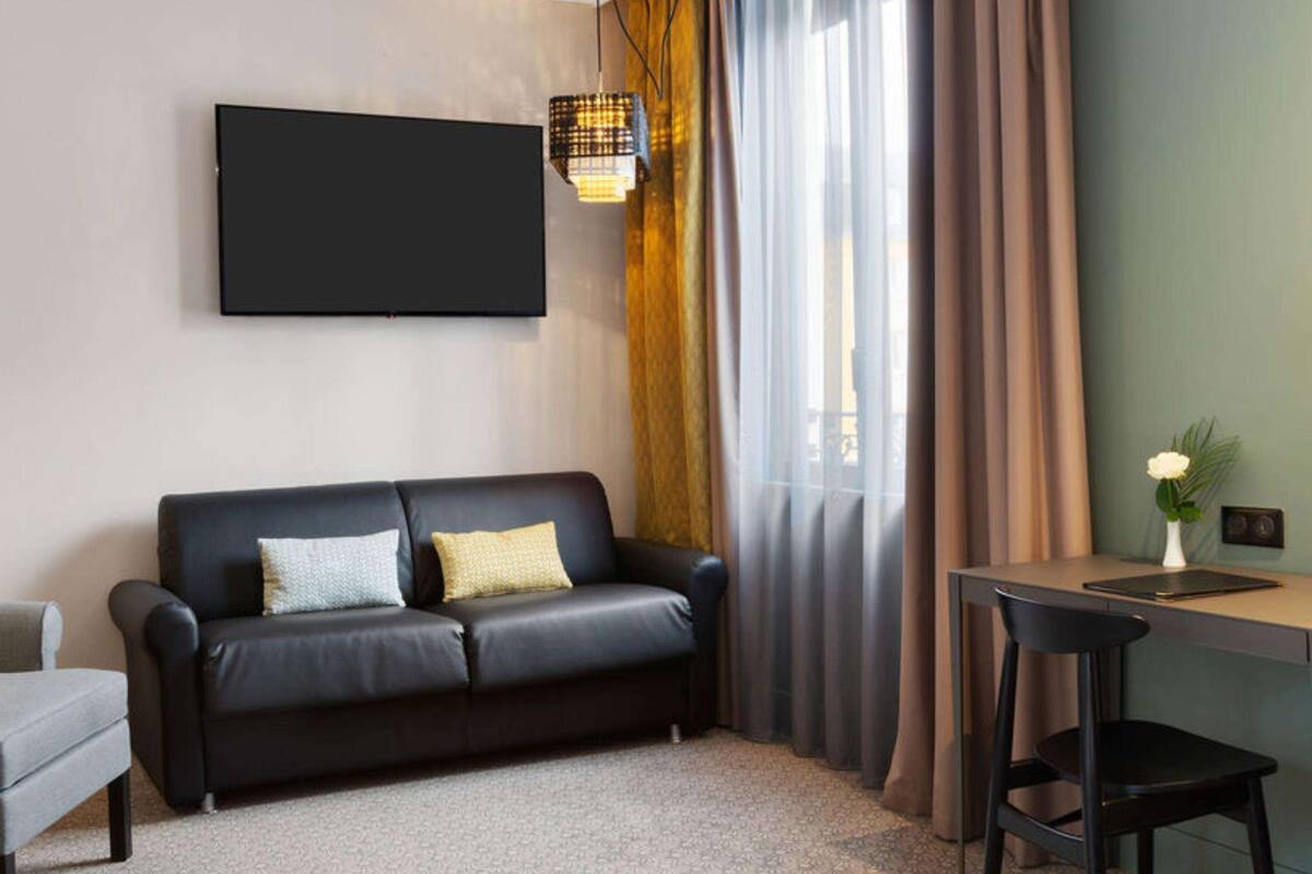 deluxe room, 1 queen bed, non smoking (with sofabed) | in-room safe, desk, laptop workspace, blackout curtains