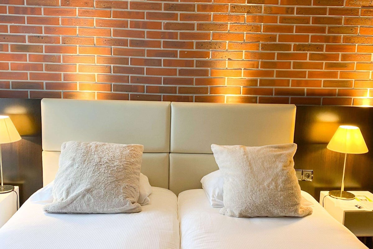 classic room, 2 single beds, non smoking | in-room safe, desk, laptop workspace, blackout curtains