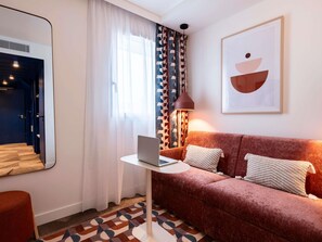 Premium bedding, pillow-top beds, in-room safe, soundproofing