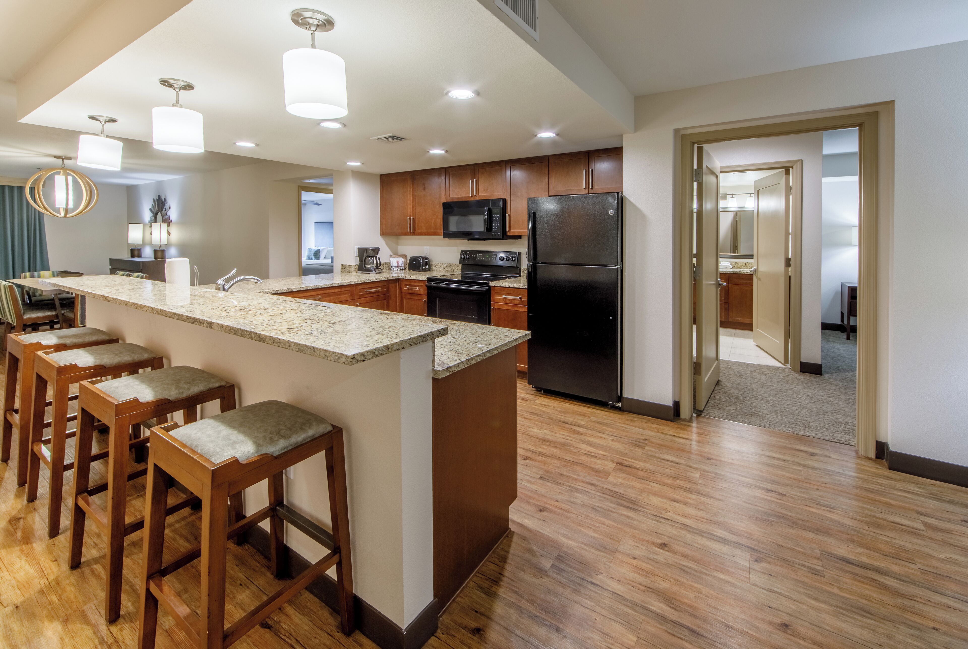 Standard Room, 1 King Bed, Non Smoking | Private kitchen | Full-sized fridge, microwave, oven, stovetop