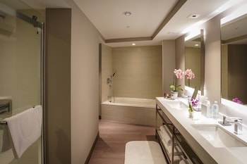 Combined shower/tub, free toiletries, hair dryer, bathrobes at San Juan Marriott Resort and Stellaris Casino
