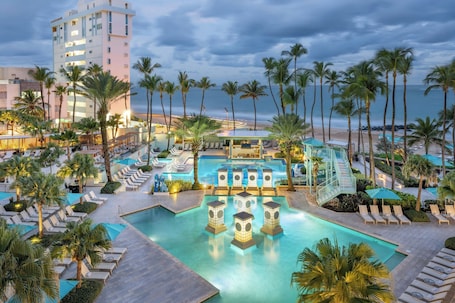 2 outdoor pools, pool umbrellas