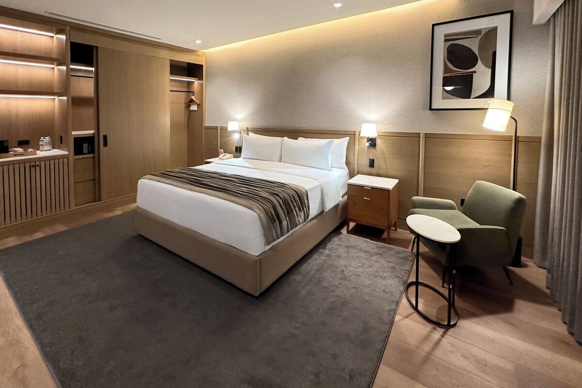 Premium Suite, City View | Premium bedding, in-room safe, desk, laptop workspace