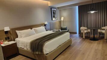 Premium Suite, City View | Premium bedding, in-room safe, desk, laptop workspace