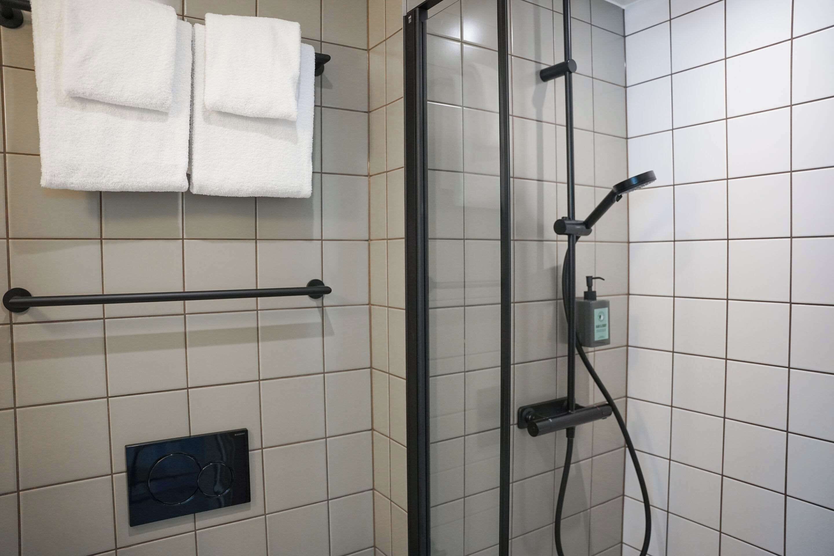 compact double room (140cm bed) | bathroom | hair dryer, towels