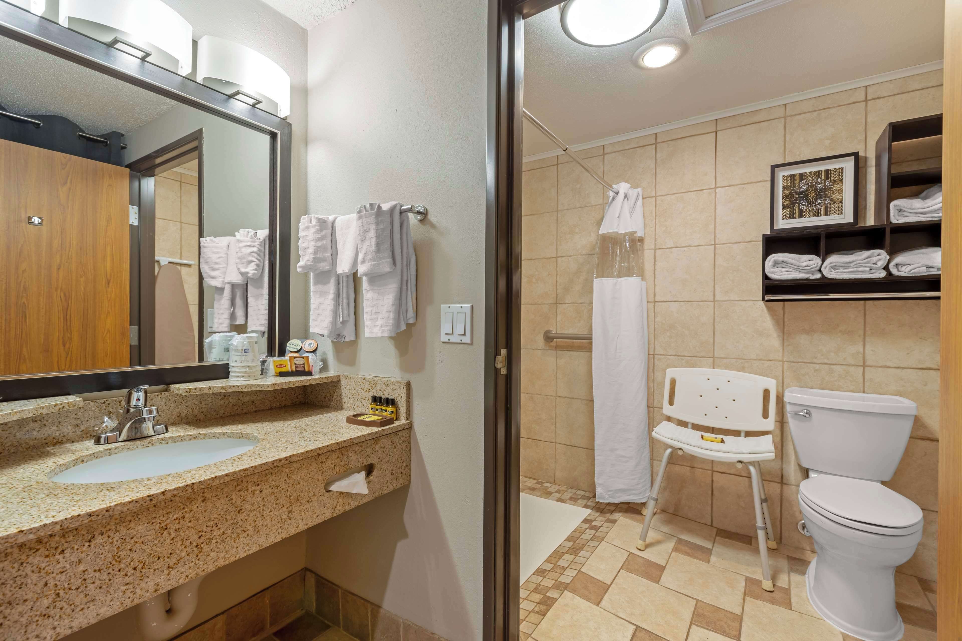 standard room, 2 queen beds, accessible, refrigerator & microwave (1st floor) | bathroom | combined shower/bathtub, designer toiletries, hair dryer, towels