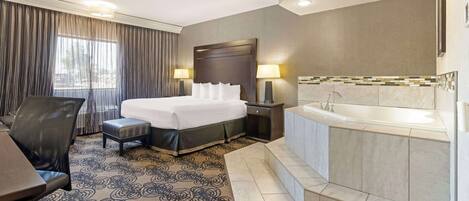 Standard Room, 1 King Bed, Non Smoking, Jetted Tub | In-room safe, desk, laptop workspace, blackout drapes