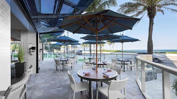 Breakfast, lunch, dinner served; Caribbean cuisine, pool views
