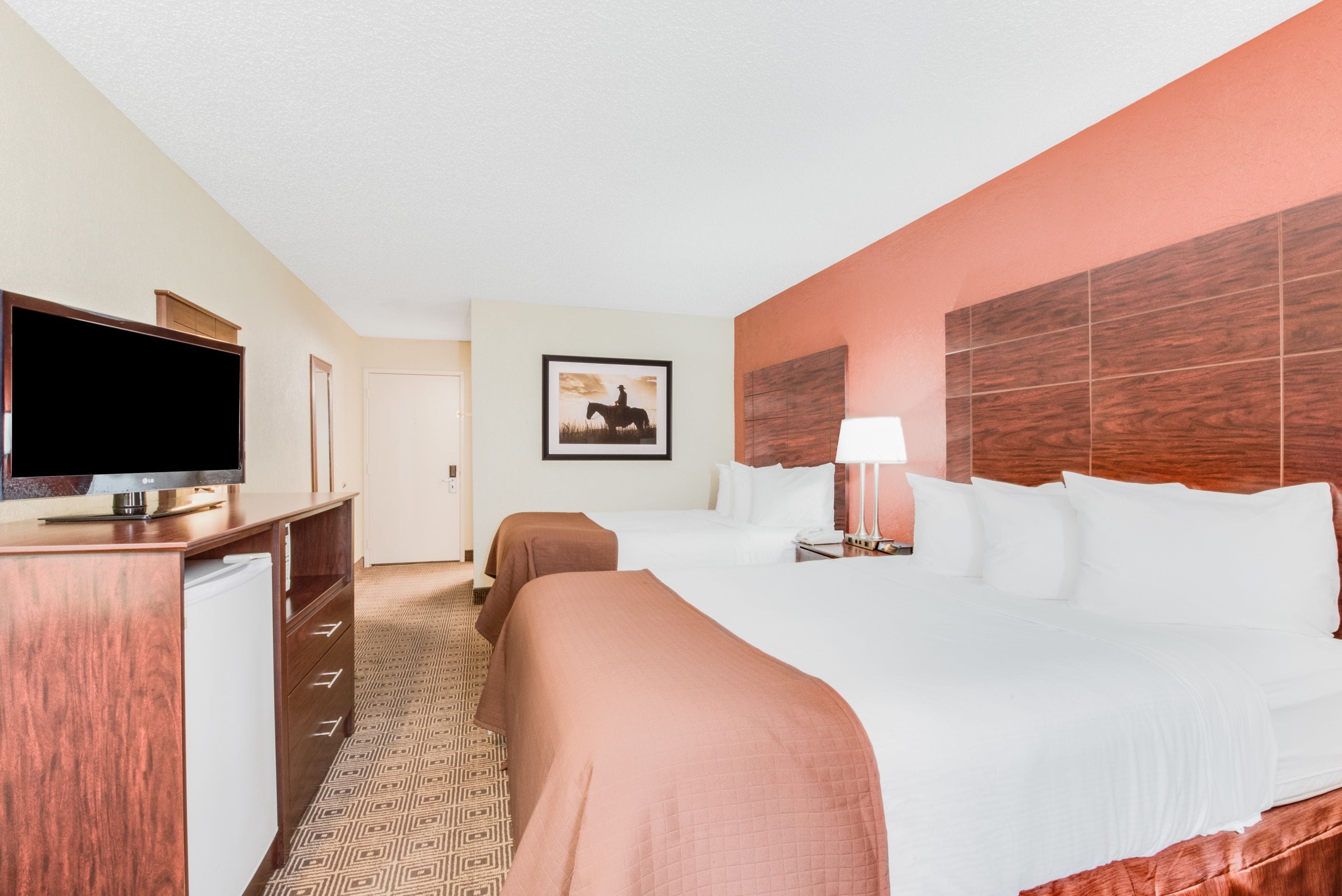 standard room, 2 queen beds | desk, laptop workspace, iron/ironing board, free cots/infant beds