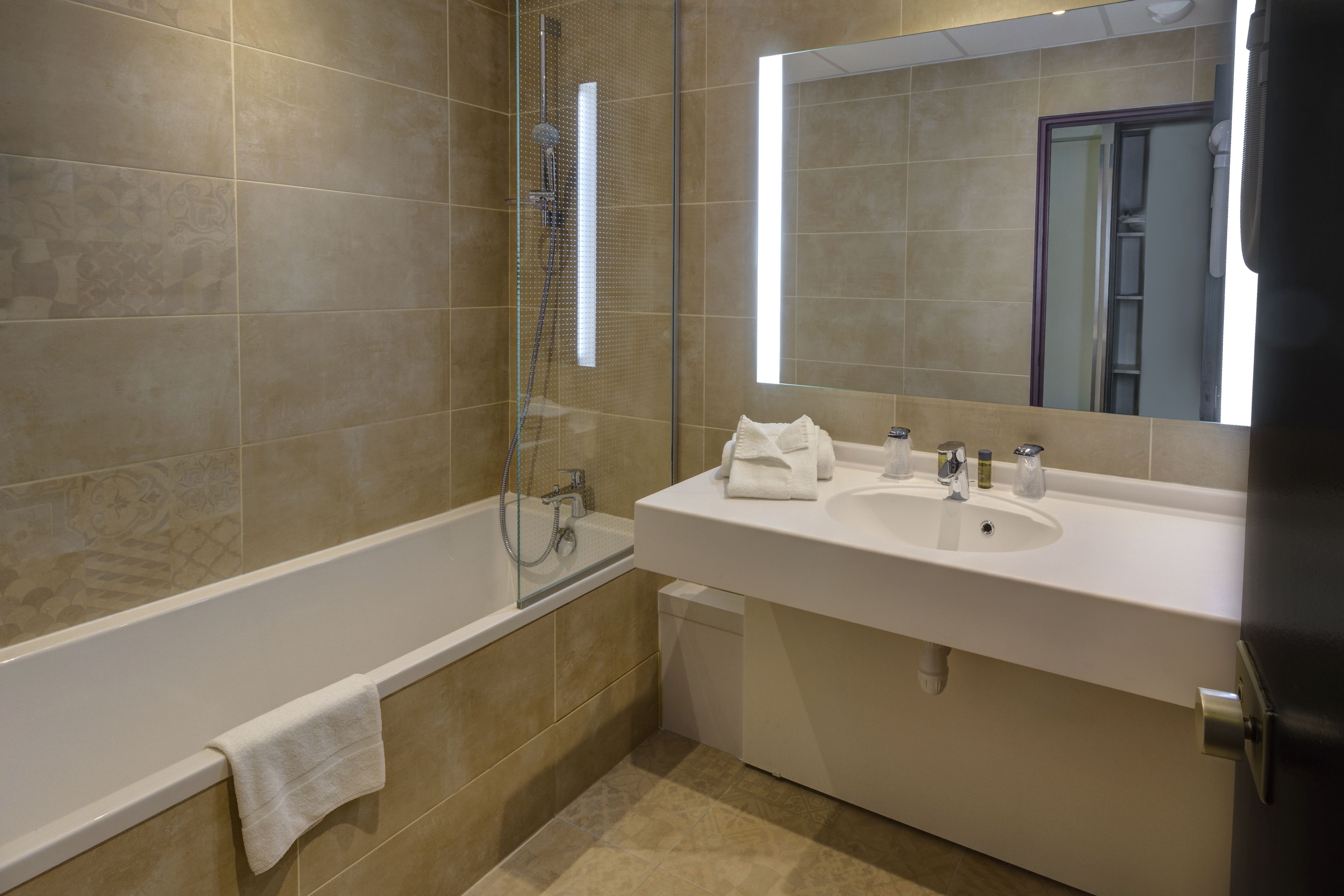 free toiletries, hair dryer, slippers, towels