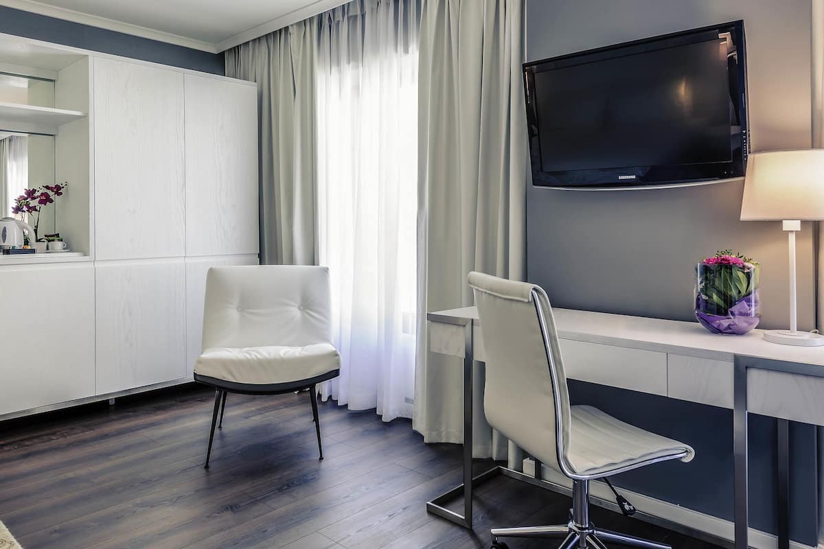Estudio, 1 cama doble | 1 dormitorio, edredones de plumas, colchones con acolchado adicional