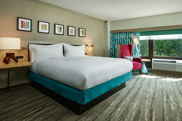 Hypo-allergenic bedding, desk, laptop workspace, blackout curtains