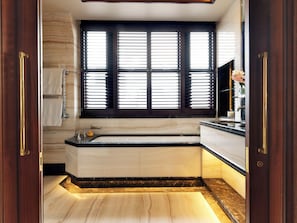 Shower, designer toiletries, hair dryer, bathrobes