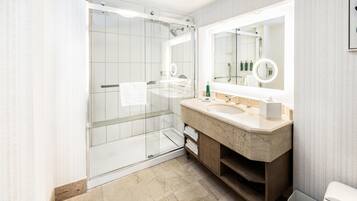 Deluxe Room, 1 King Bed | Bathroom | Designer toiletries, hair dryer, towels