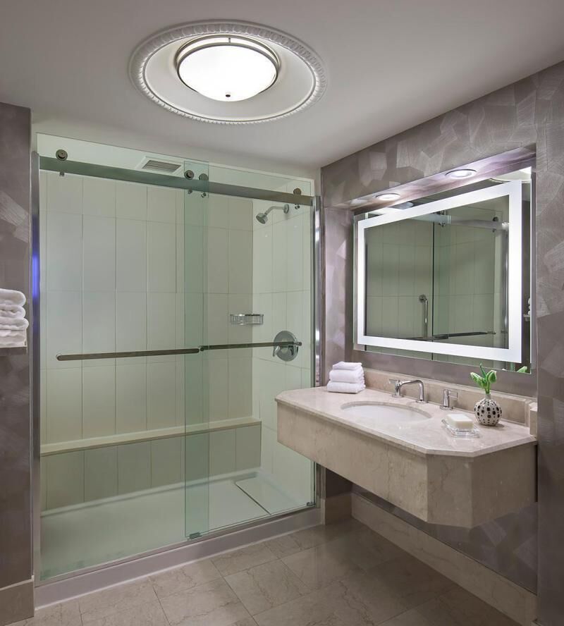 Bathroom | Designer toiletries, hair dryer, towels