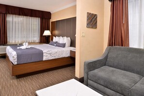 In-room safe, desk, laptop workspace, blackout curtains - Best Western Hollywood Plaza Hotel - Walk of Fame Film City LA (Los Angeles)
