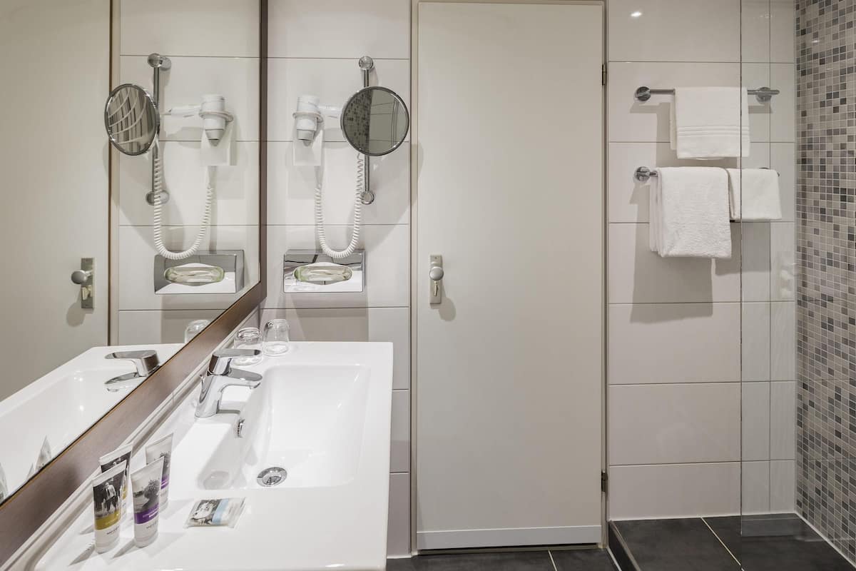 In-room safe, desk, blackout curtains, iron/ironing board