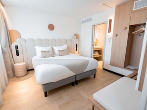 Premium-sengetøj, minibar, pengeskab på værelset, skrivebord