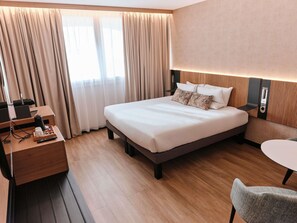 Ropa de cama de alta calidad y minibar 