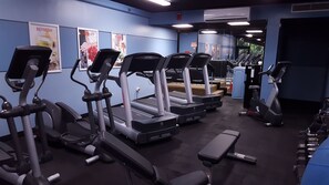 Stay fit on the go with our fully equipped gym featuring treadmills and elliptical machines.