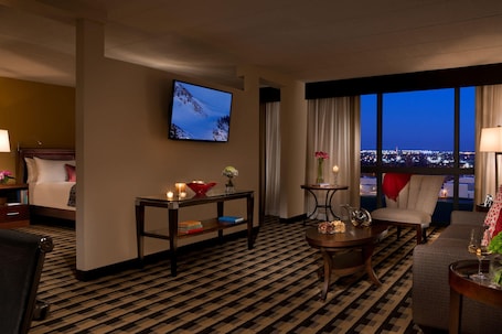 Suite, 1 Bedroom | Hypo-allergenic bedding, desk, blackout drapes, iron/ironing board. M Hotel Buffalo