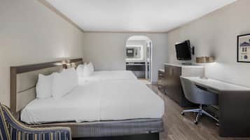 Premium bedding, desk, laptop workspace, blackout curtains