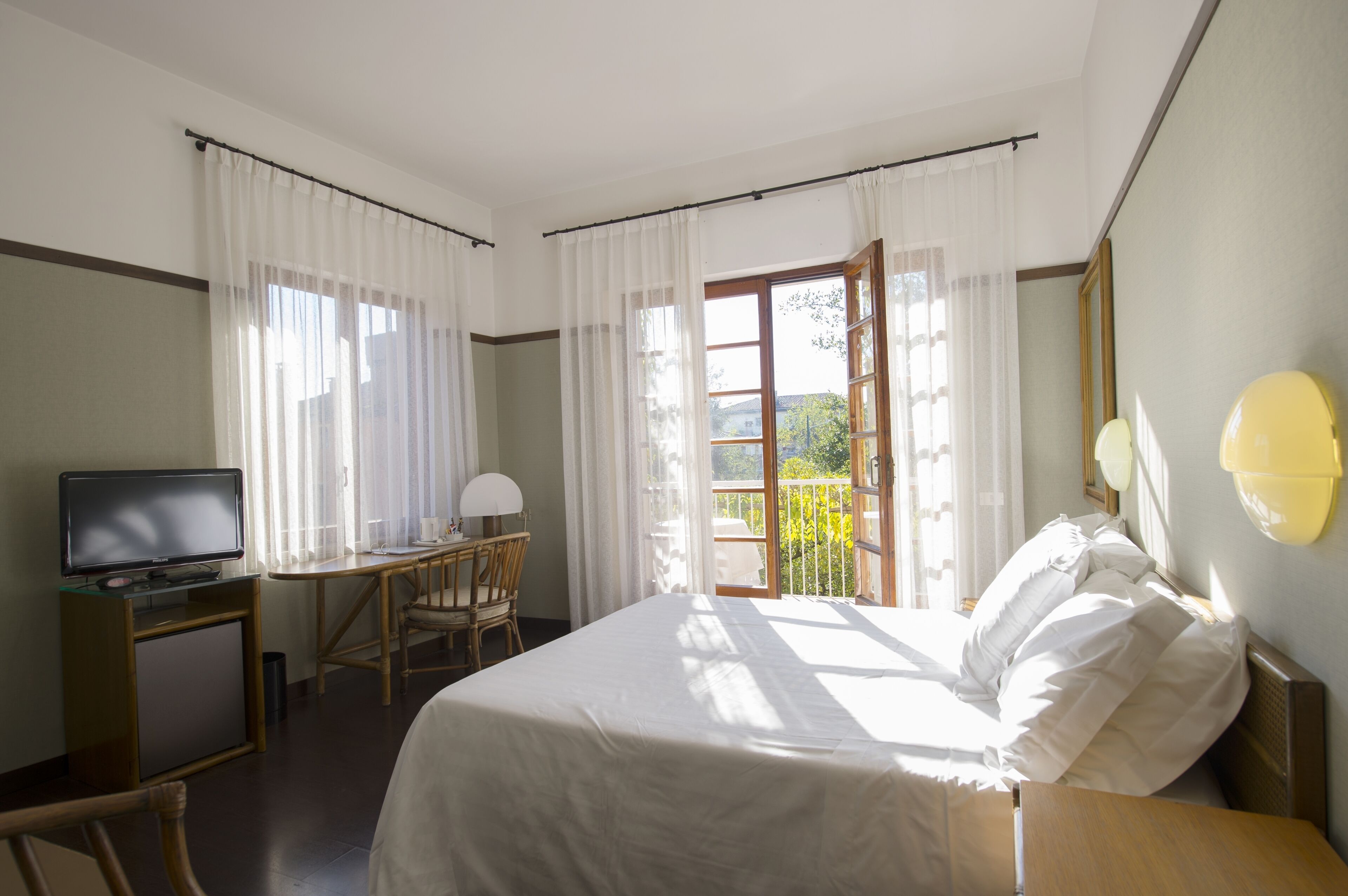 Hypo-allergenic bedding available, down comforters, minibar