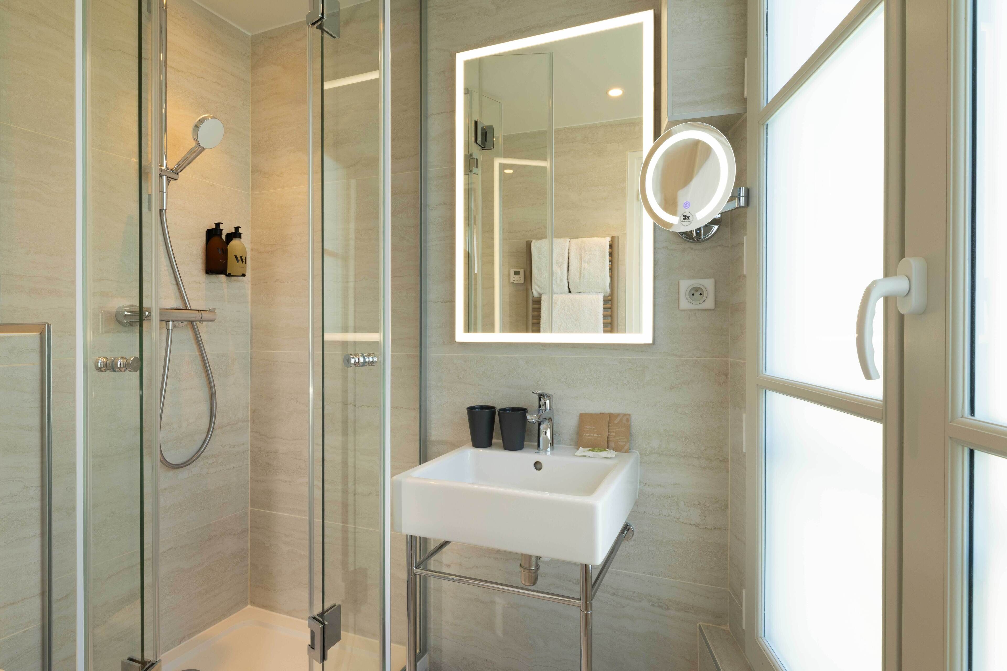 classic double room | bathroom | eco-friendly toiletries, hair dryer, slippers, towels