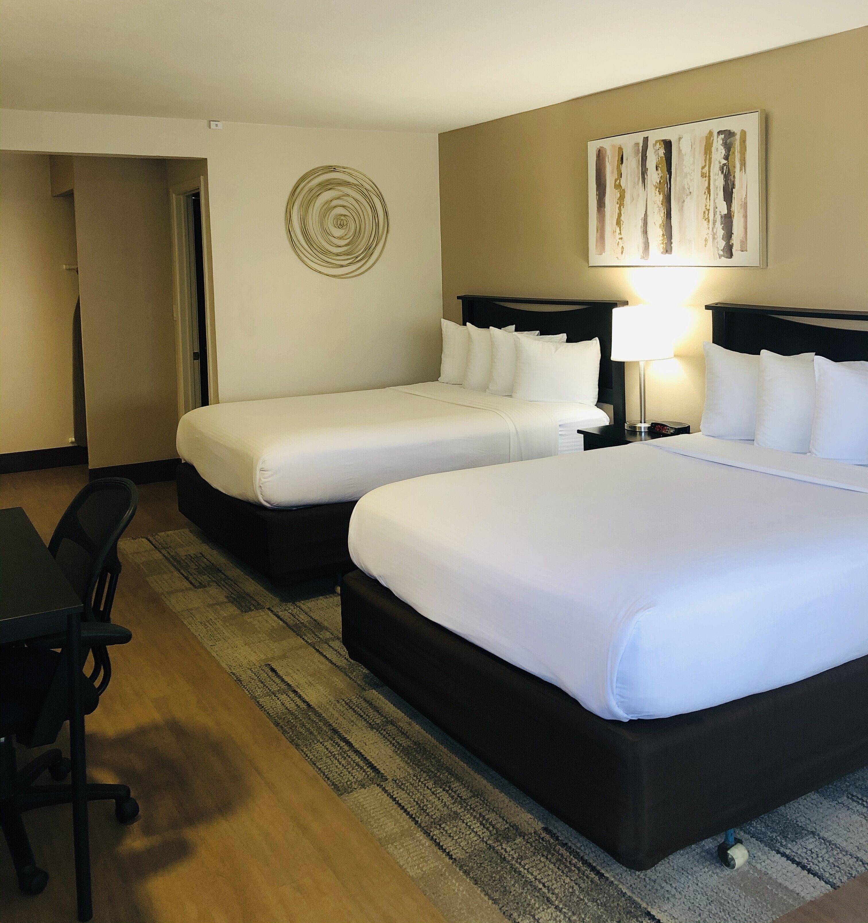 Pillowtop beds, desk, laptop workspace, iron/ironing board