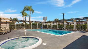 Outdoor pool, open 9:00 AM to 11:00 PM, pool umbrellas, sun loungers
