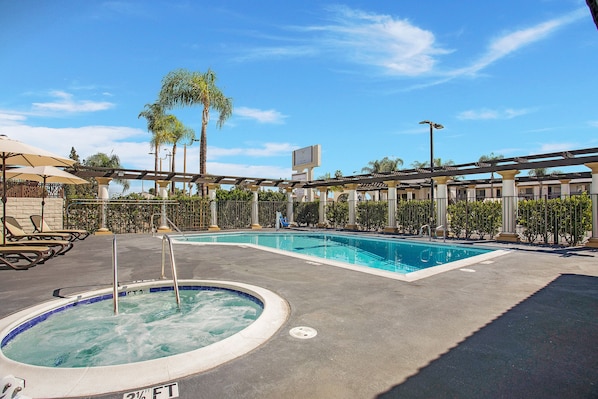 Outdoor pool, open 9:00 AM to 11:00 PM, pool umbrellas, sun loungers
