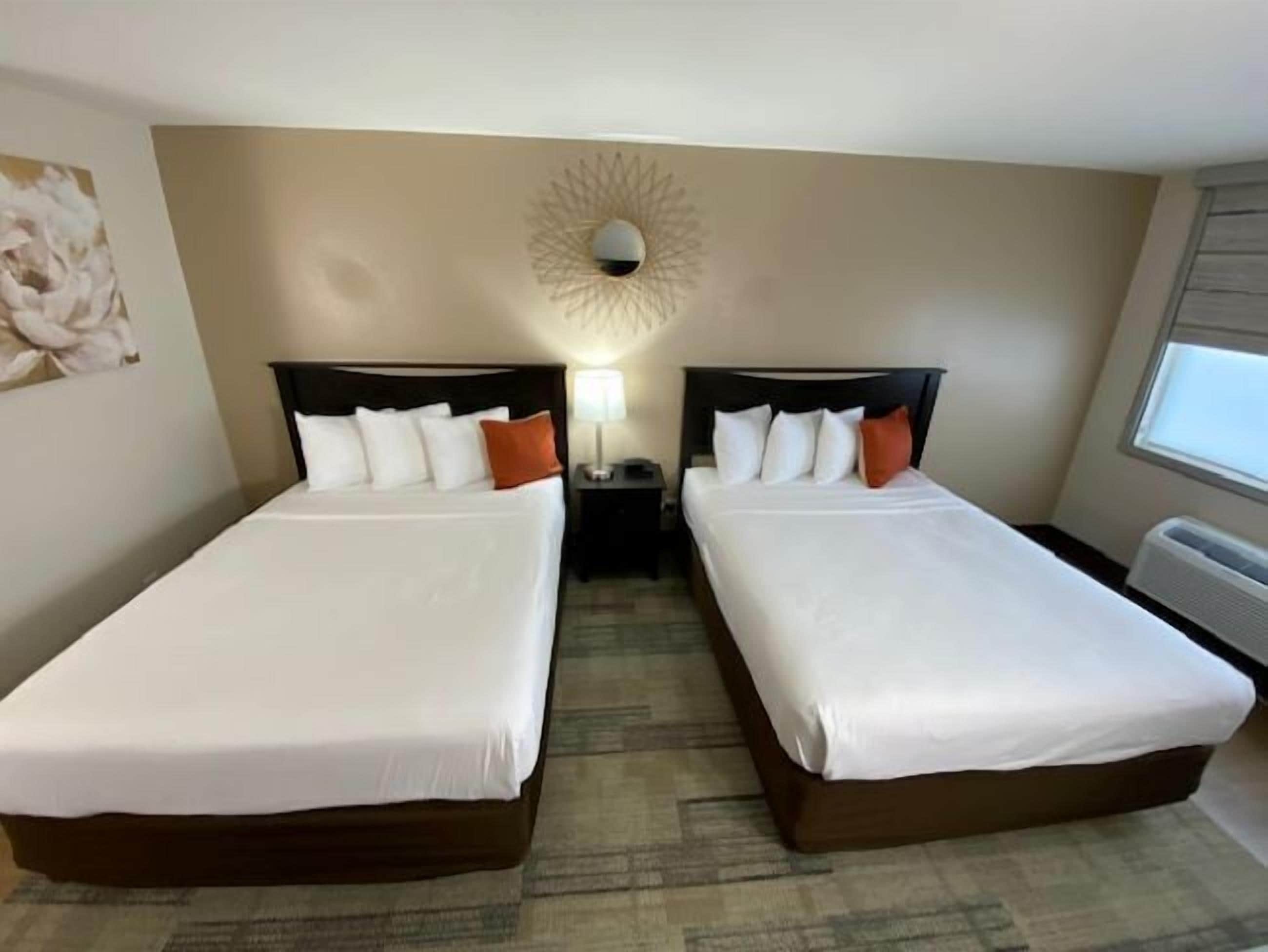 standard room, 2 queen beds, non smoking, refrigerator & microwave | 1 bedroom, pillow-top beds, desk, laptop workspace