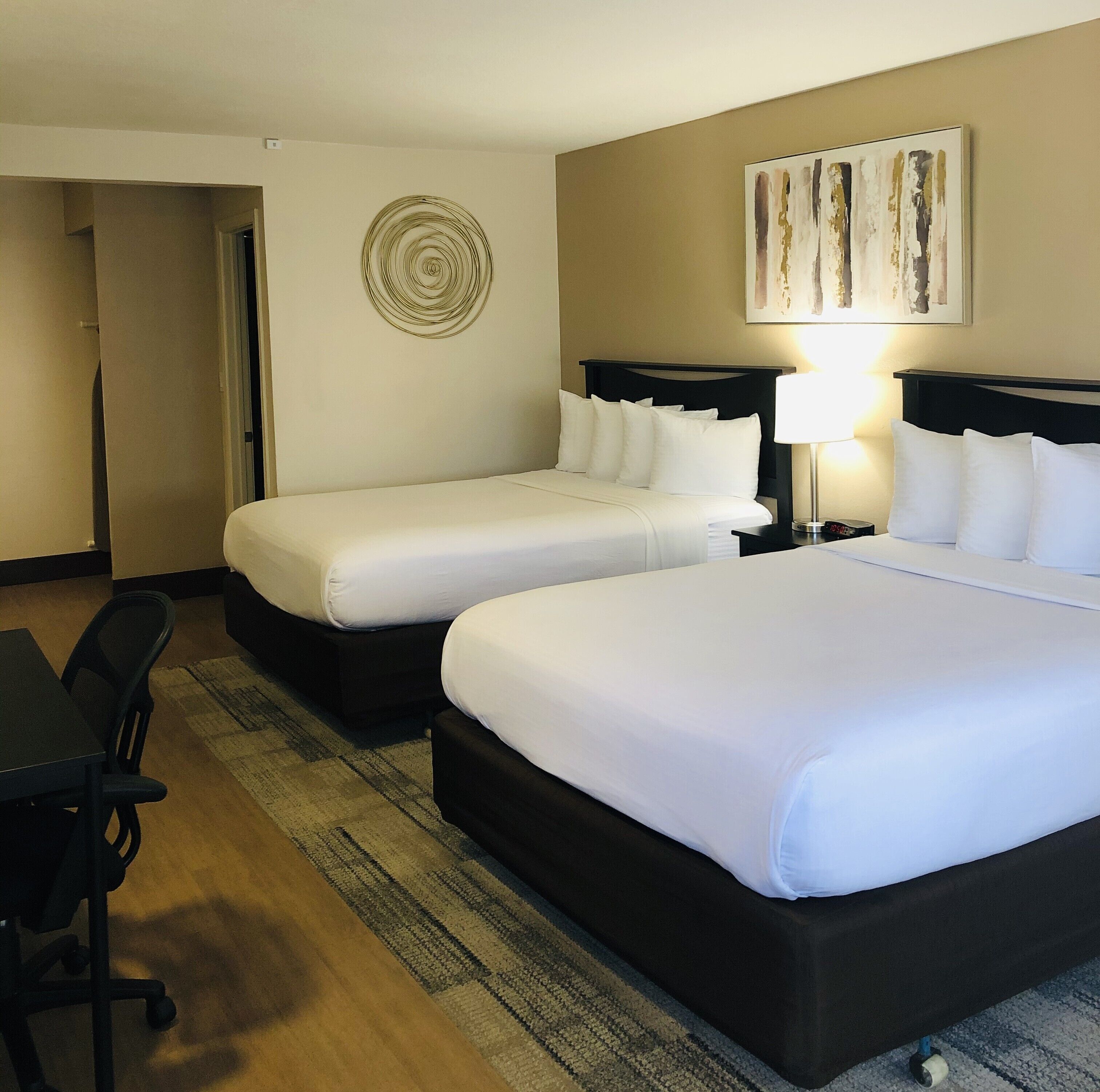 Pillow-top beds, desk, laptop workspace, iron/ironing board