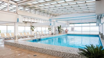 Indoor pool, outdoor pool, pool umbrellas, sun loungers