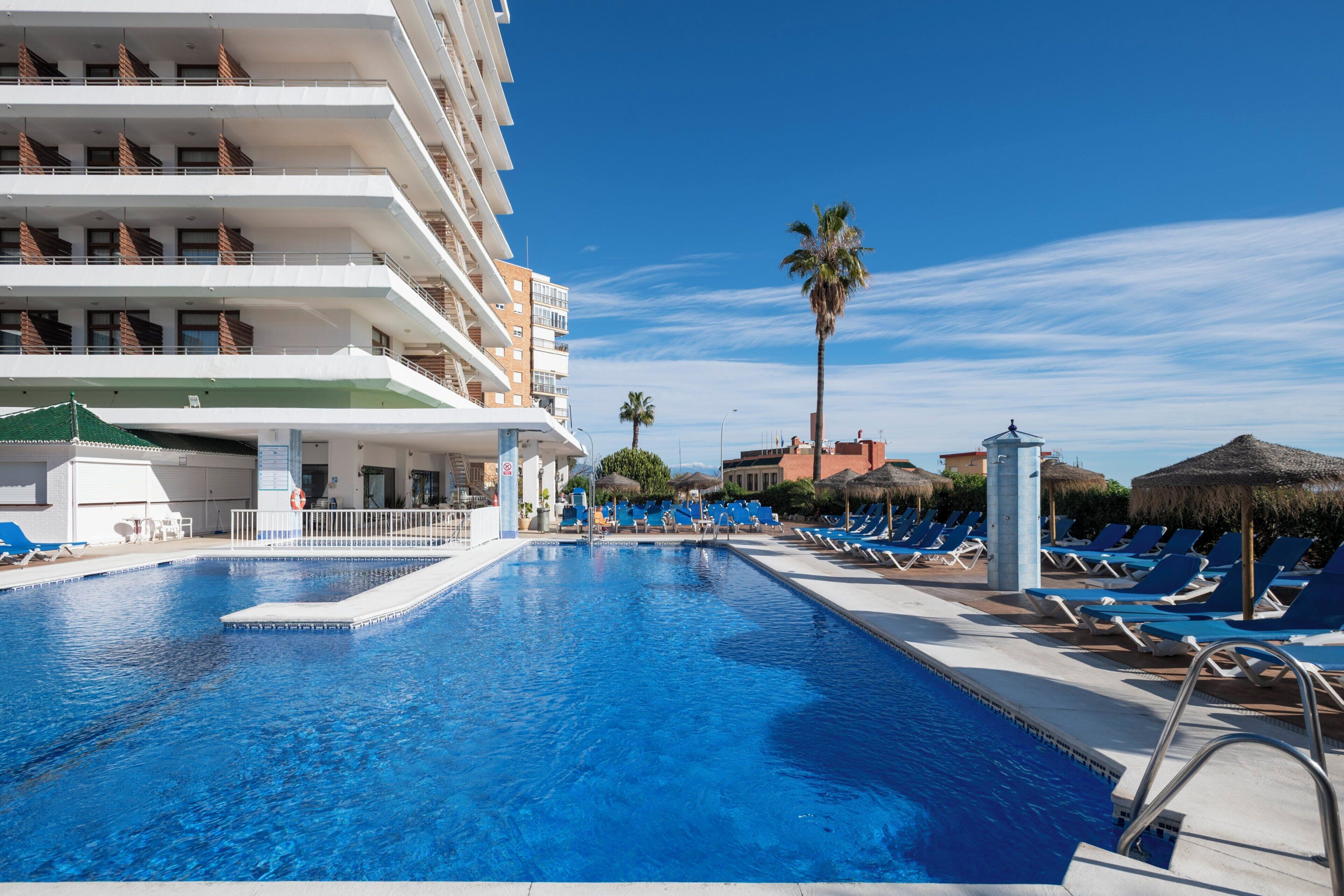 Indoor pool, seasonal outdoor pool, pool umbrellas, sun loungers