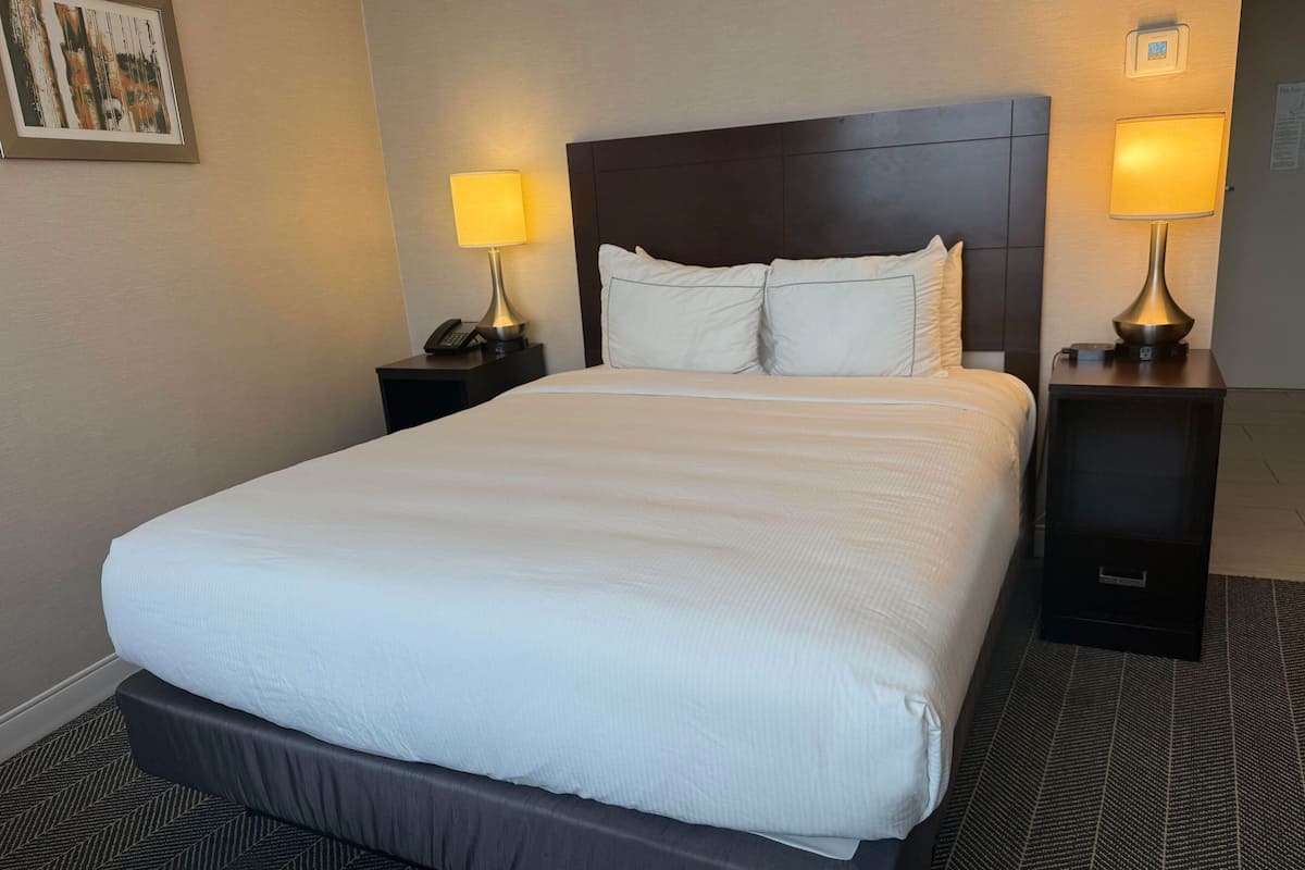 1 bedroom, premium bedding, laptop workspace, blackout drapes