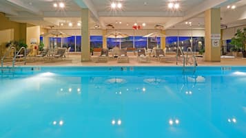 Indoor pool, seasonal outdoor pool, pool umbrellas, sun loungers