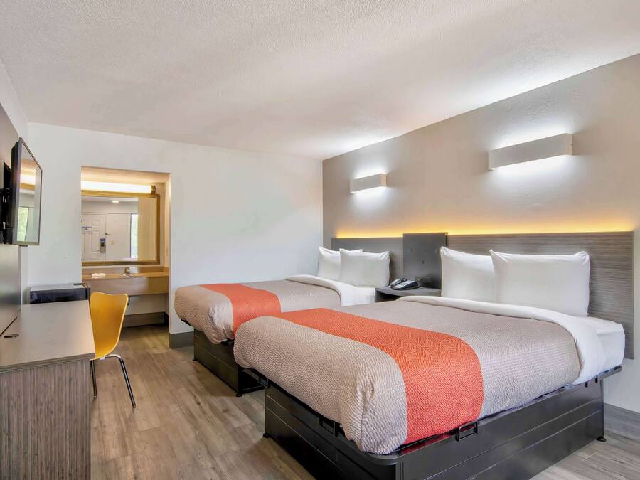 Desk, free WiFi, bed sheets, alarm clocks