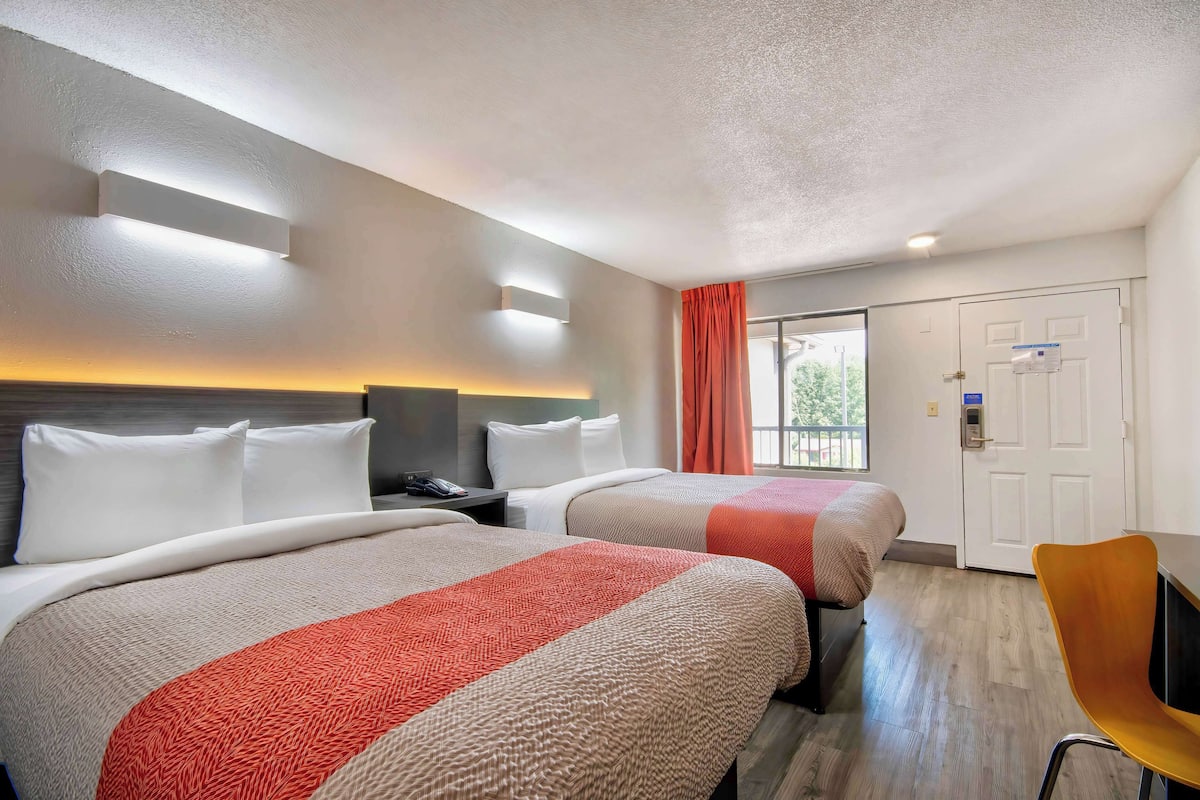 Desk, free WiFi, bed sheets, alarm clocks